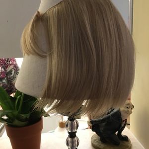 Rene of Paris creamy blonde mod acrylics wig.